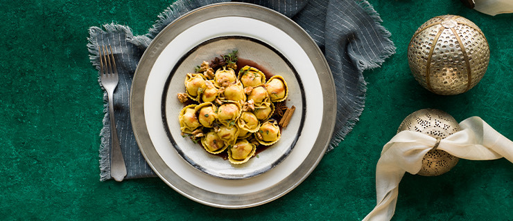Chicken Mozzarella Tortelloni with mulled wine reduction, walnuts and thyme