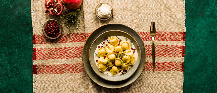 Cheese Lovers Tortelloni with mascarpone cream, pomegranate and thyme