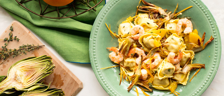Recipe - Cheese lovers Tortelloni with sauté artichokes, shrimps and orange - Giovanni Rana