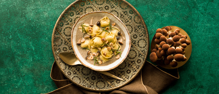 Organic Baby Spinah & Roasted Garlic Tortelloni with honey mushroom cream, hazelnut and rosemary