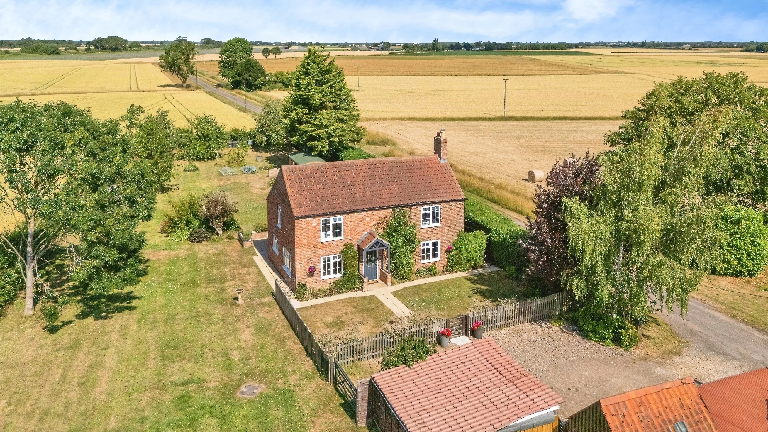 A rural detached cottage with an acre of land