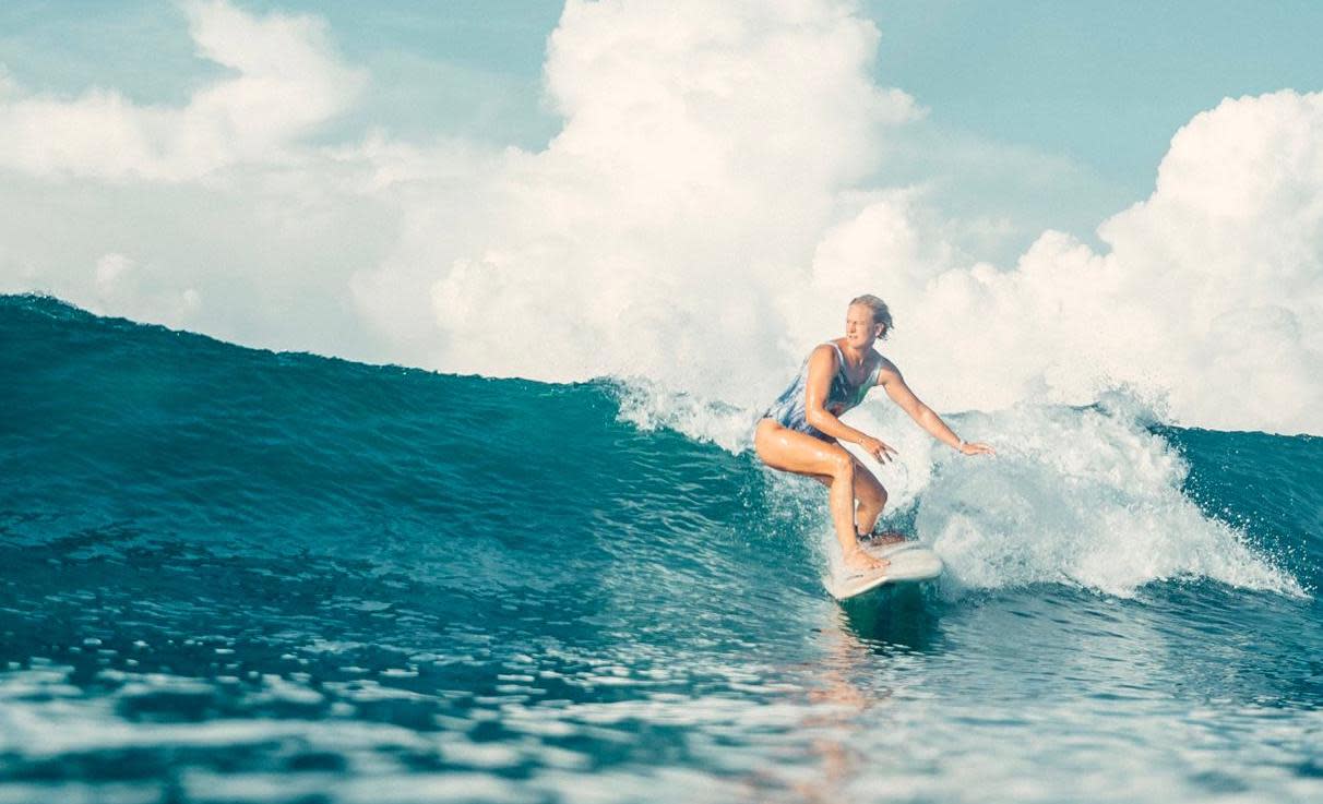 Kristina skier surfing in Sri Lanka