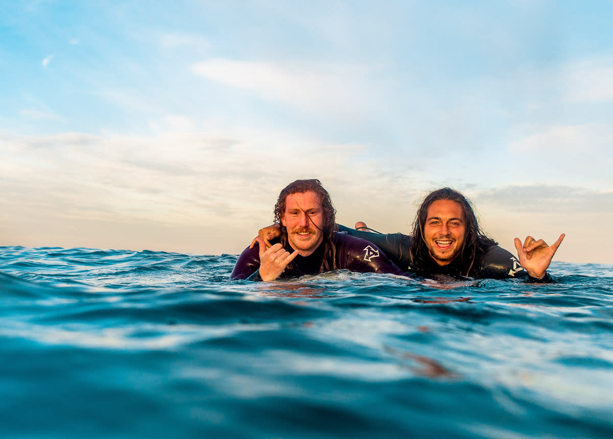 surfers in water