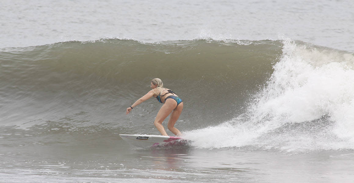 girl surfing bali