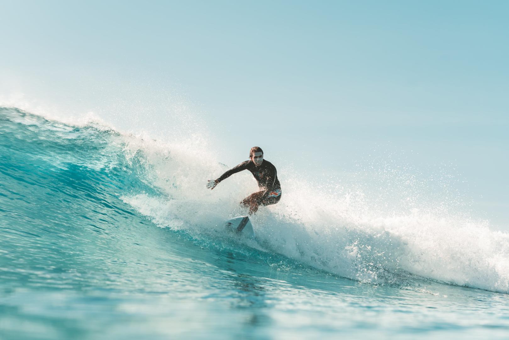 Advanced surfer in the maldives