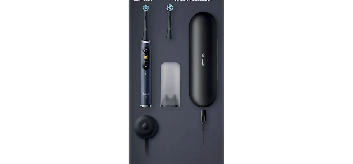 Oral-B iO9 Zahnbürste mit Verpackung, Reise-Etui mit Schnellladestation und „Made in Germany“ Anhänger.