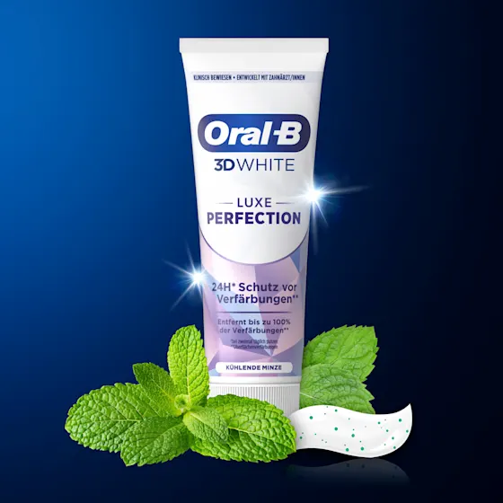 Oral-B 3D White Luxe Perfection Zahnpasta, Tube und Verpackung, mit dem Hinweis "Entfernt bis zu 100% der Verfärbungen".