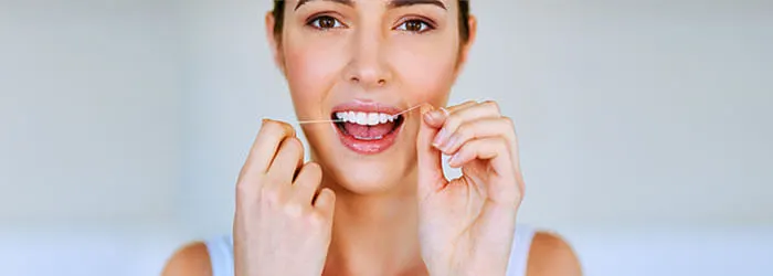 Die Bedeutung von Zahnseide für Ihre Zähne article banner