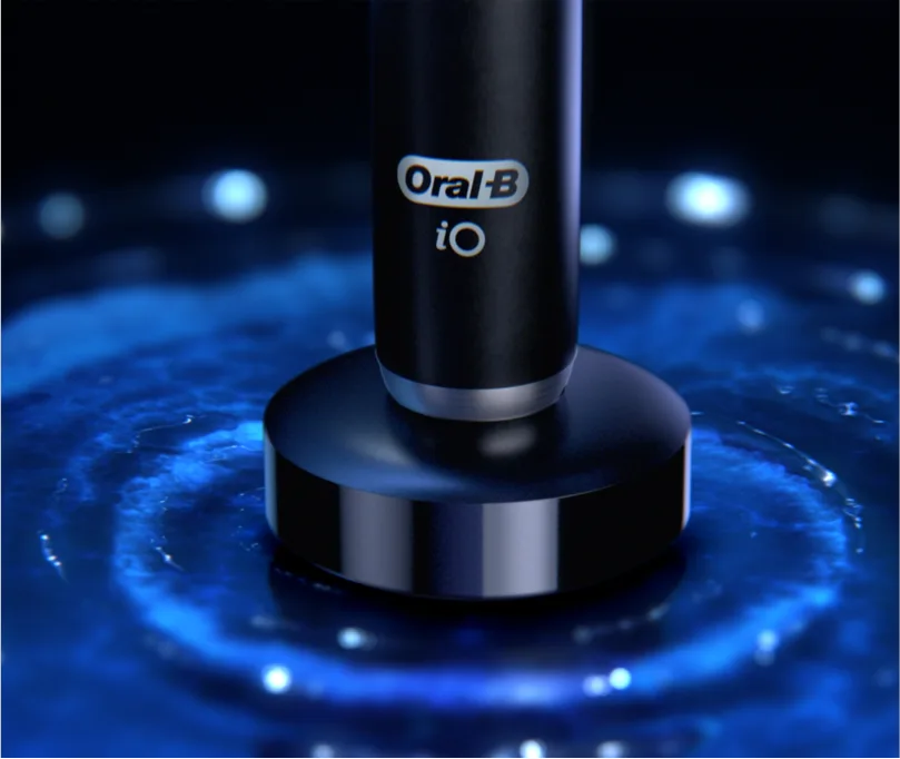 Black Oral-B iO Series 9 toothbrush on charging stand 