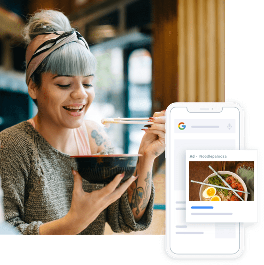 Bluehost Girl eating food with phone showing website