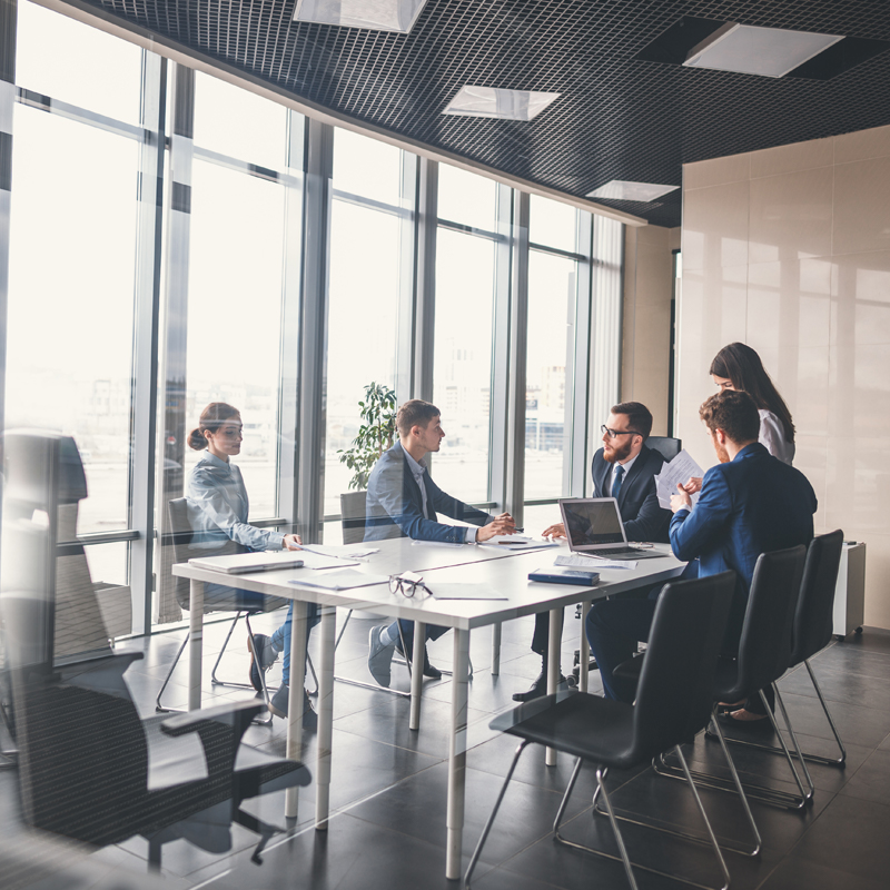 Group meeting in conference room.
