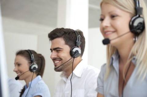 Happy call center agents at work