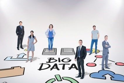 People stand over text that says "Big Data"