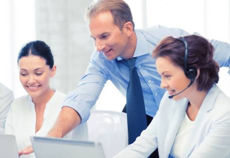 Call center manager giving feedback to agents