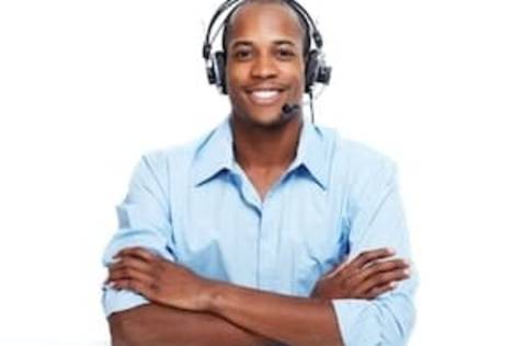 A man in a phone headset.