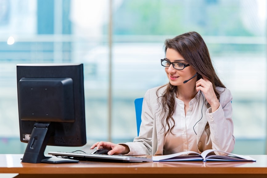 Woman at desk in a call center