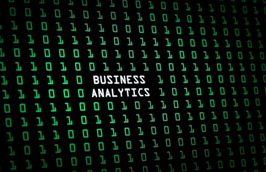 "Business analytics" text overlay on green code