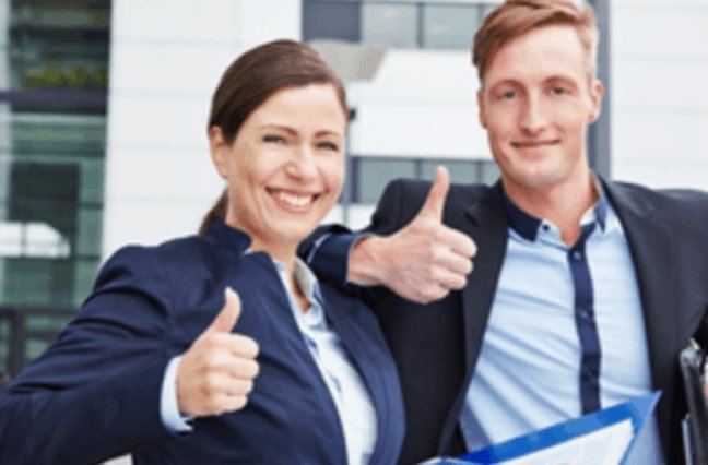 Business man and woman smiling giving thumbs up