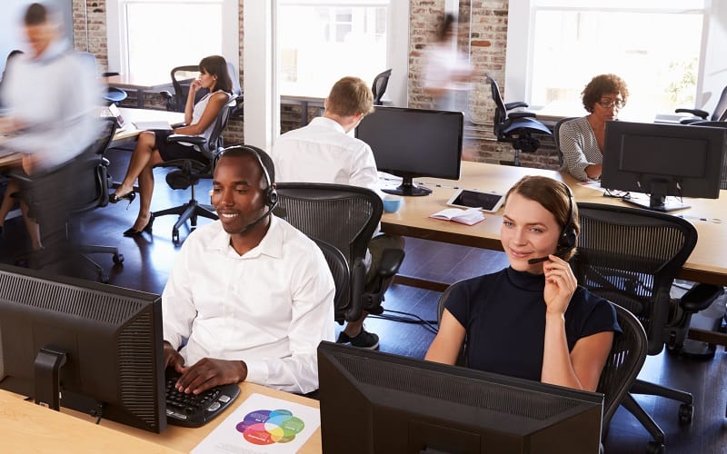 Happy busy call center agents