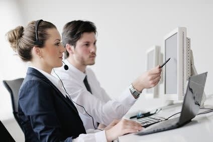 call center manager helping agent