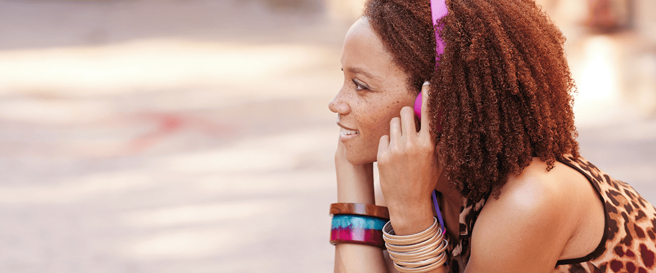 Woman Wearing Headphones Lifestyle Image