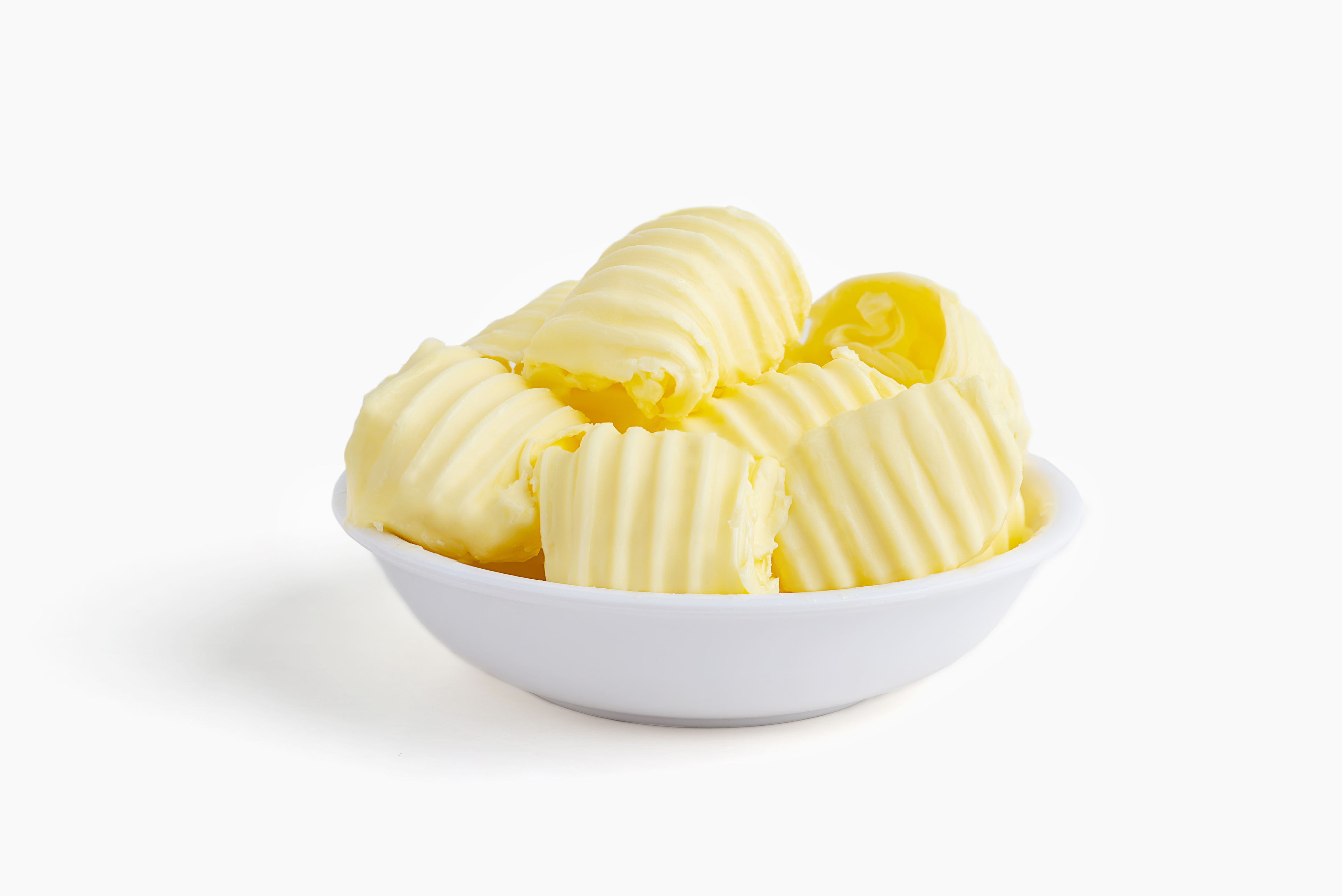 Smörrullar i vit skål - iStock-1144170331