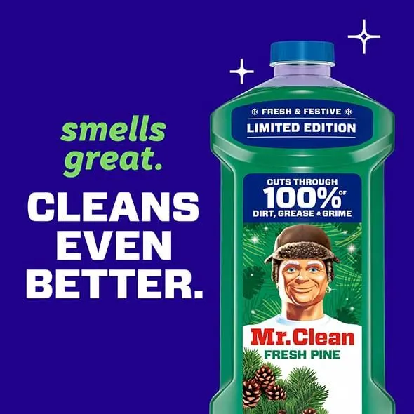 Mr Clean Fresh Pine cleaner bottle with festive design and text showcasing its cleaning power and pleasant scent