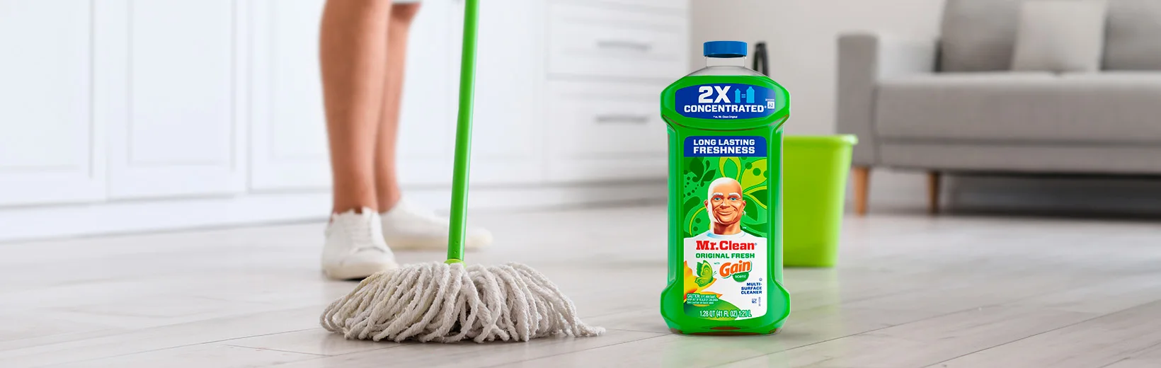 Cleaning Hardwood Floors with a mop and Multi-Surface Cleaner with Gain Original Fresh Scent