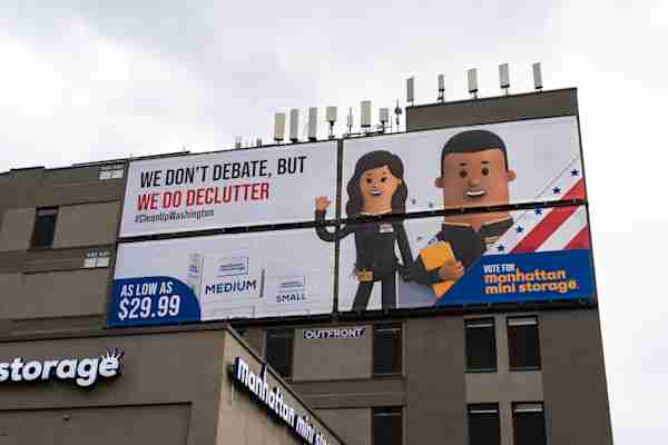 Manhattan Mini Storage on South Street Billboard that reads We dont debate, but we do declutter