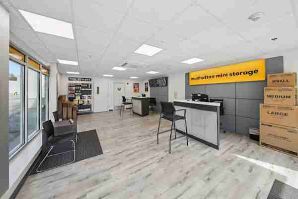 a view of the front office with neat stacks of moving boxes at Manhattan Mini Storage in Pearl River, NY