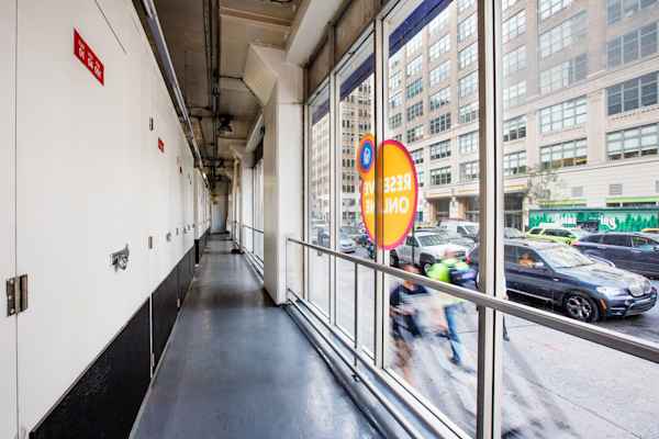 a row of self storage units with a view from the window overlooking Varick Street at Manhattan Mini Storage