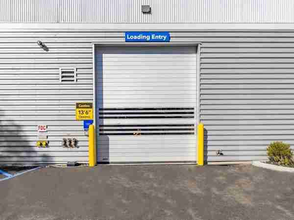 a street view of the large loading bay doors at the storage facility in Woodside, NY