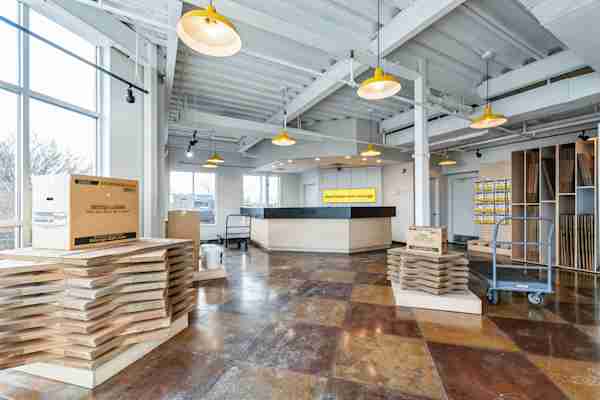 the front office of Manhattan Mini Storage in Secaucus with a view of the front desk and neat stack of moving boxes