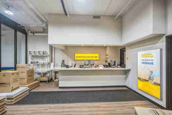 a view of the front office desk and moving and packing supplies at Manhattan Mini Storage on Varick St