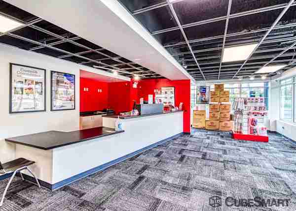 front office on Wild Ave with a view of the desk and neat rows of moving and packing supplies 