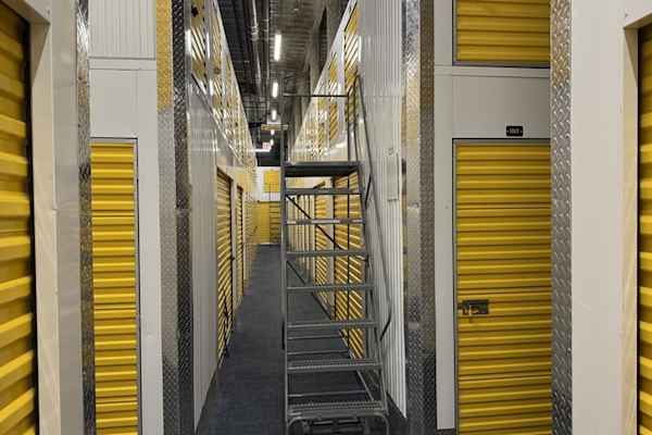 storage units with a ladder at Manhattan Mini Storage on 121st St