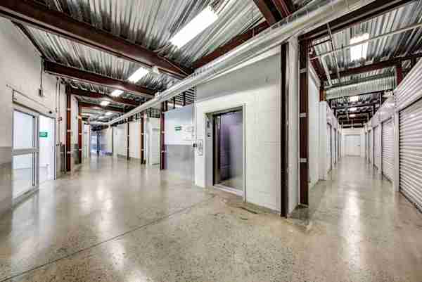 a row of storage units with elevator access at Manhattan Mini Storage in Springfield NJ 