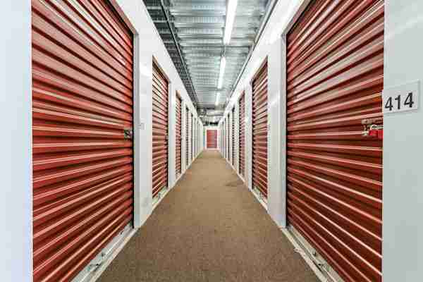 a well-lit hallway of climate controlled self storage units at Manhattan Mini Storage on Flanagan Way in Secaucus NJ
