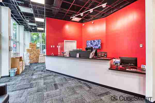 front office on Caton Place with a view of the desk and neat stacks of moving and packing supplies