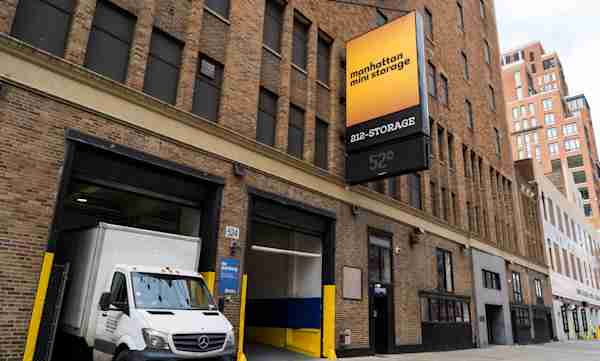street view of the Manhattan Mini Storage Chelsea facility showing a moving van backed into the drive-in loading bay