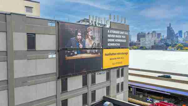 Manhattan Mini Storage on South Street Billboard that reads A Storage Unit Has Never Made You Drink Homemade Kombucha