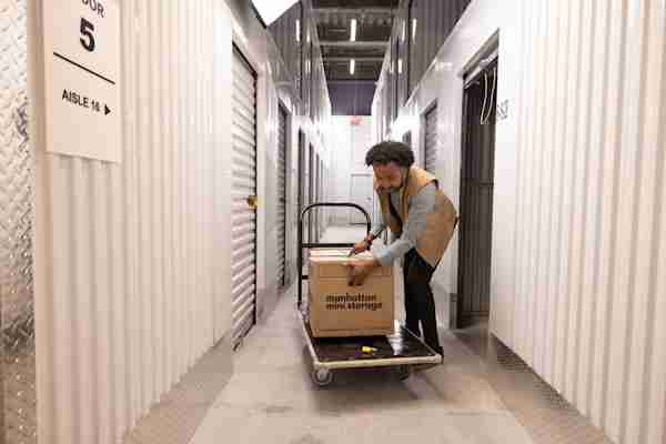 Manhattan Mini Storage in Chelsea - man moving into his storage unit