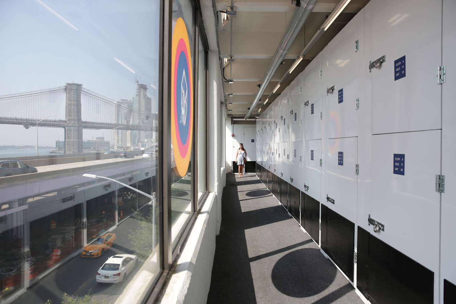 Closet size storage units with a view of the Manhattan skyline and Bridge