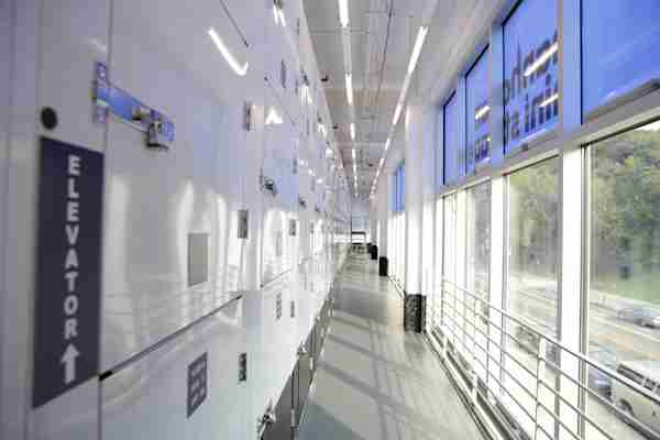  a row of storage units with a window and a view onto Dyckman Street at Manhattan Mini Storage 