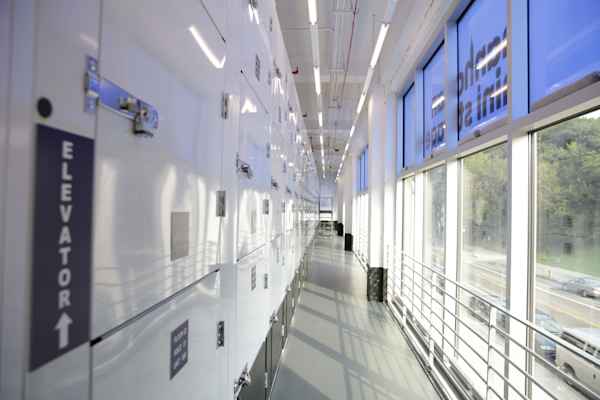  a row of storage units with a window and a view onto Dyckman Street at Manhattan Mini Storage 