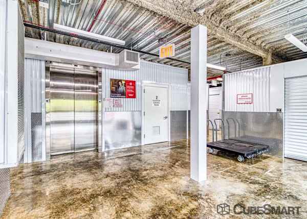 elevator and moving carts with a view of an easy to access self storage unit in Staten Island