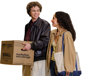A view of two people carrying boxes