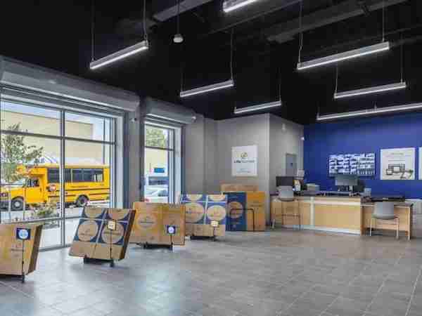 a view of the front office of Manhattan Mini Storage on 121st street with a view of the desk and neat stacks of moving and packing supplies