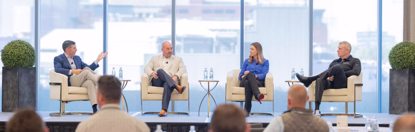 Panelists speaking during the Harris Williams 2024 Commercial & Residential Services Conference