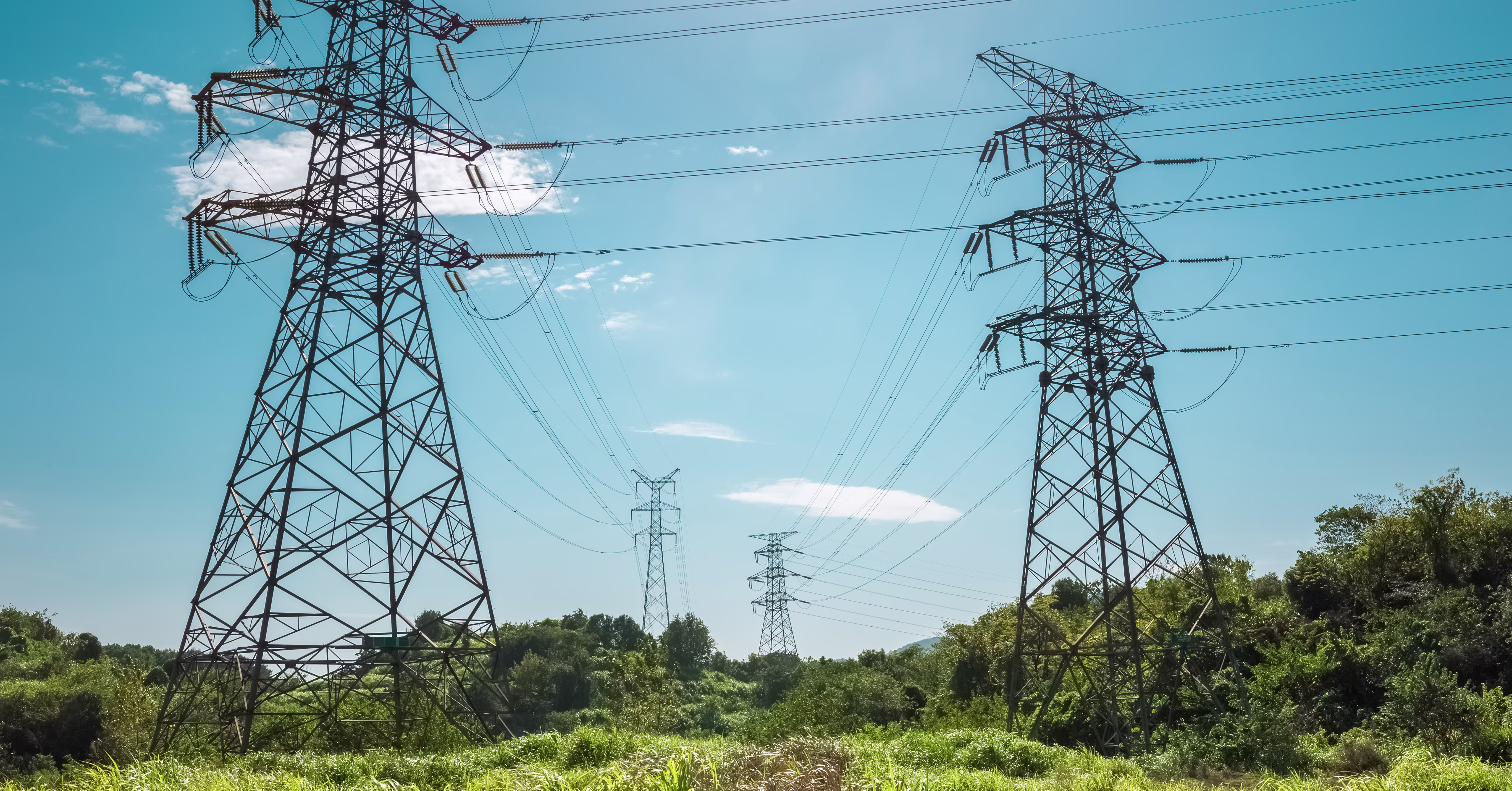 bigstock-electricity-pylon-against-a-bl-77062775.jpg
